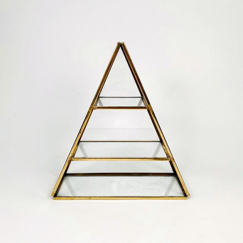 pyramid crystal display made out of brass with glass shelves 