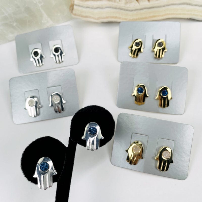multiple earrings displayed to show the differences in the stone types 