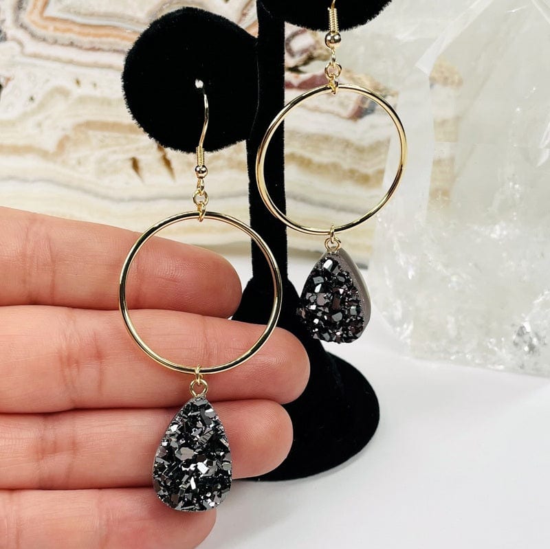 earrings displayed to show how they hang 