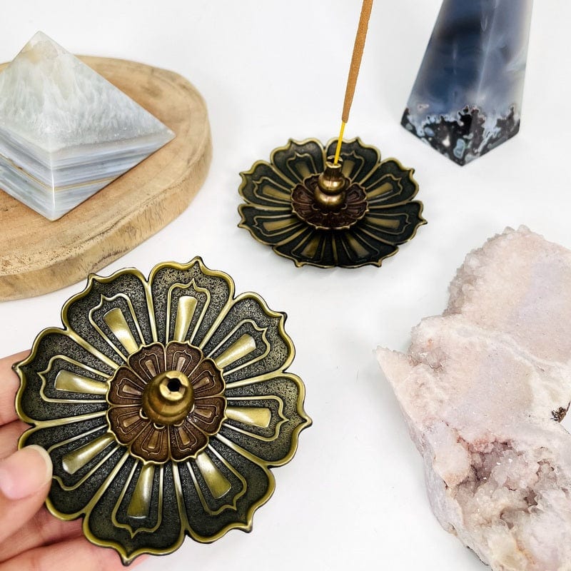 close up of the details on the brass incense holder 