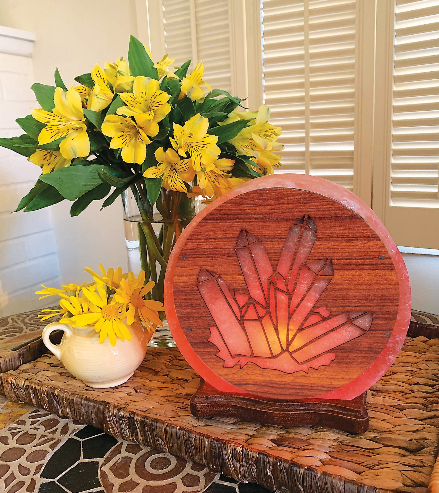 Himalayan Salt Lamp with crystal design, lit and on display