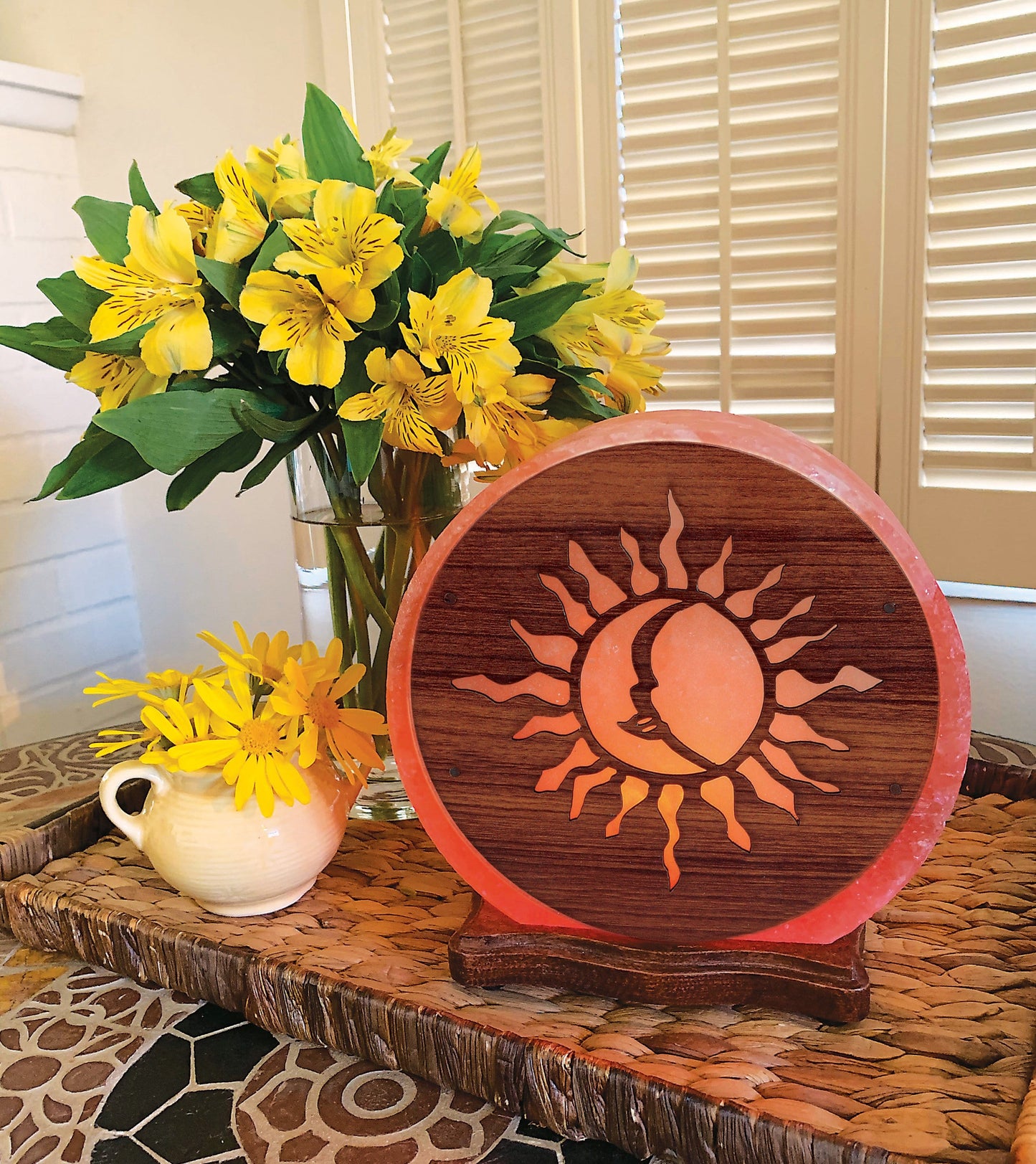 Himalayan Salt Lamp sun moon design, lit and on display
