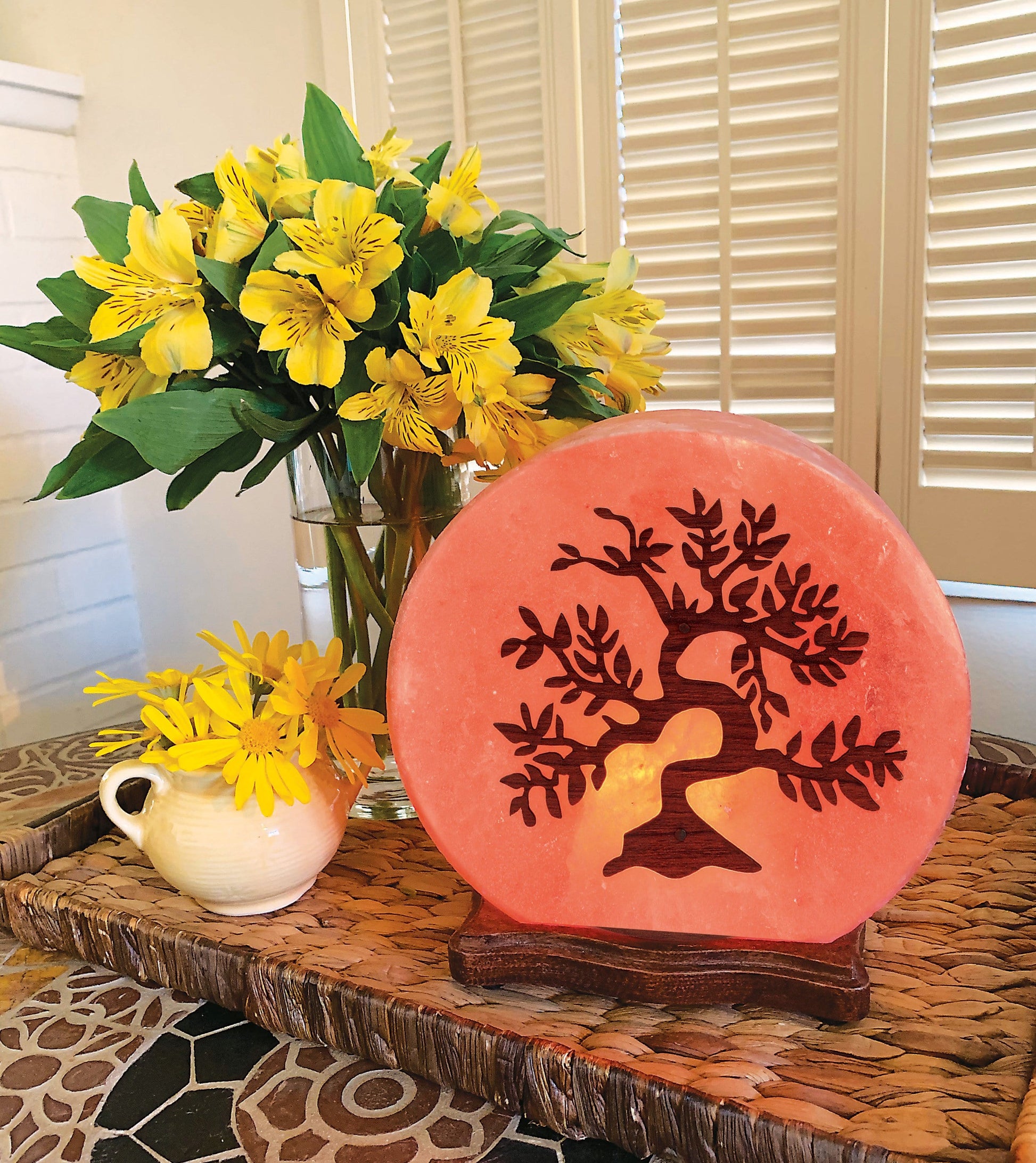 Himalayan Salt Lamp tree design, lit on display