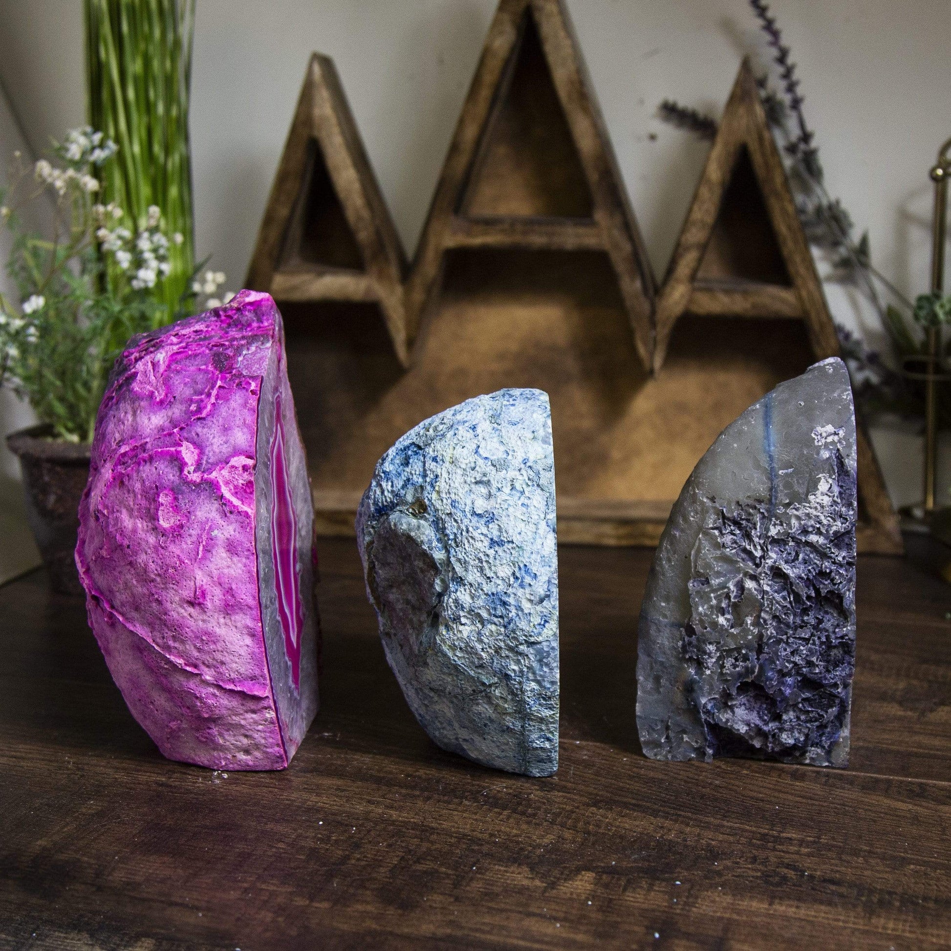 Three agate lamps shown at an angle to display agate thickness. Lamps are within an alter.