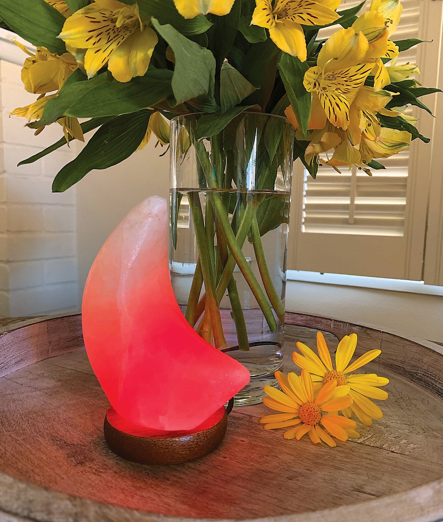 Peach color Himalayan Salt Lamp lit with the red light