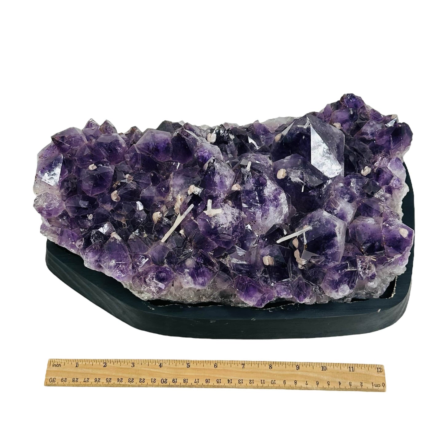 Amethyst Crystal Cluster on Wooden Base - Large Table Setting next to a ruler for size reference 
