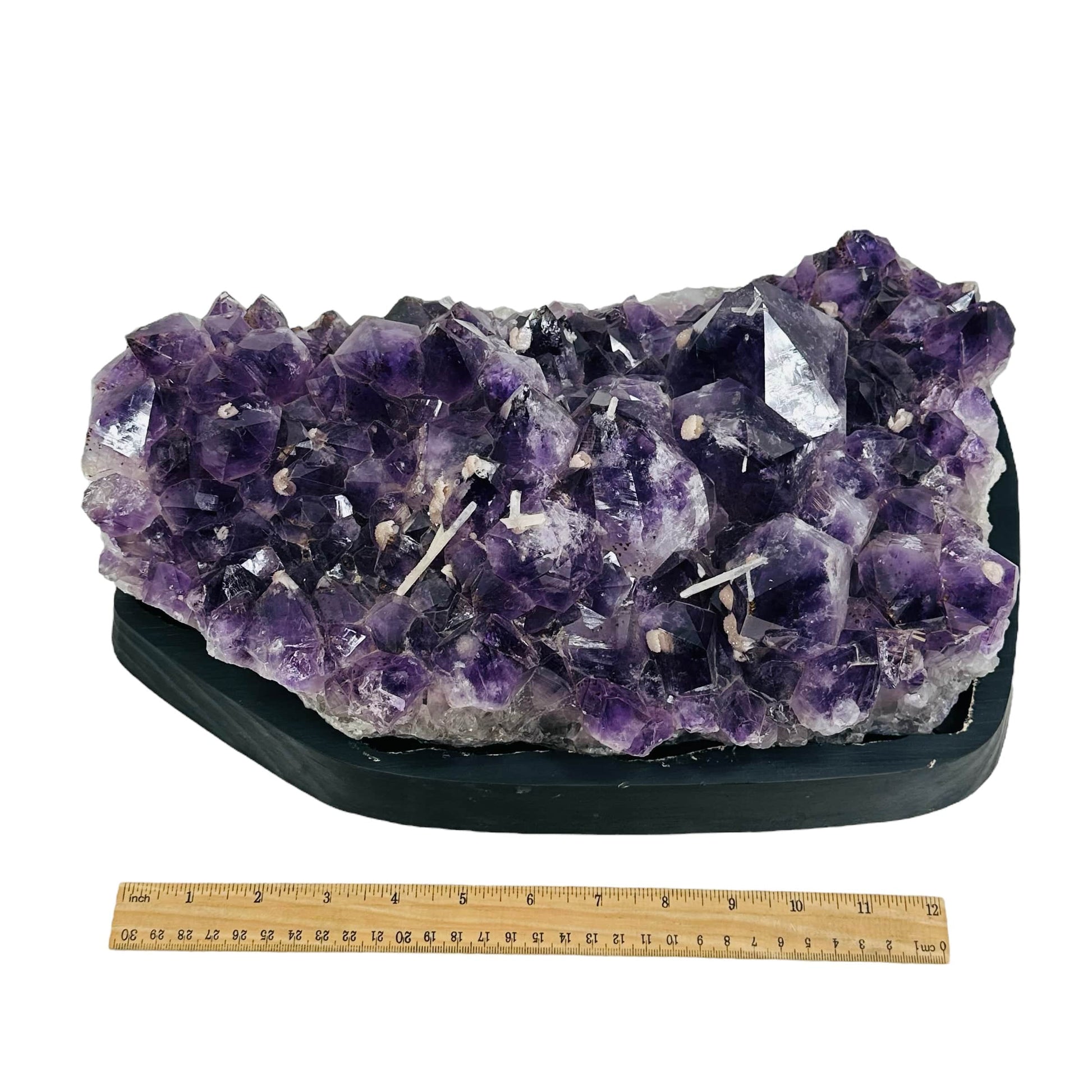 Amethyst Crystal Cluster on Wooden Base - Large Table Setting next to a ruler for size reference 