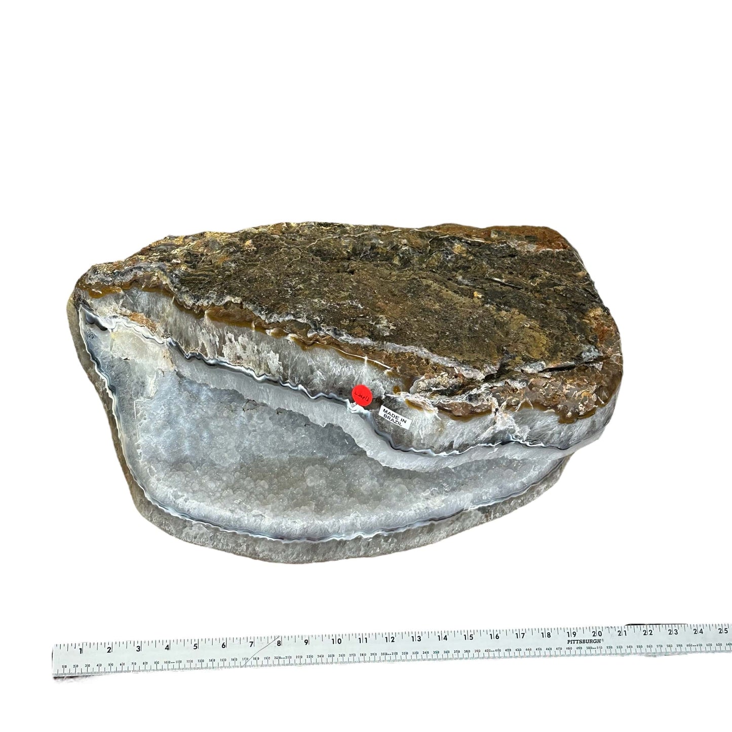 Semi-polished Agate Freeform next to a ruler for size reference 