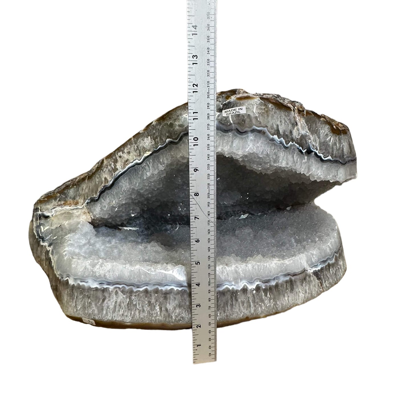 Semi-polished Agate Freeform next to a ruler for size reference 