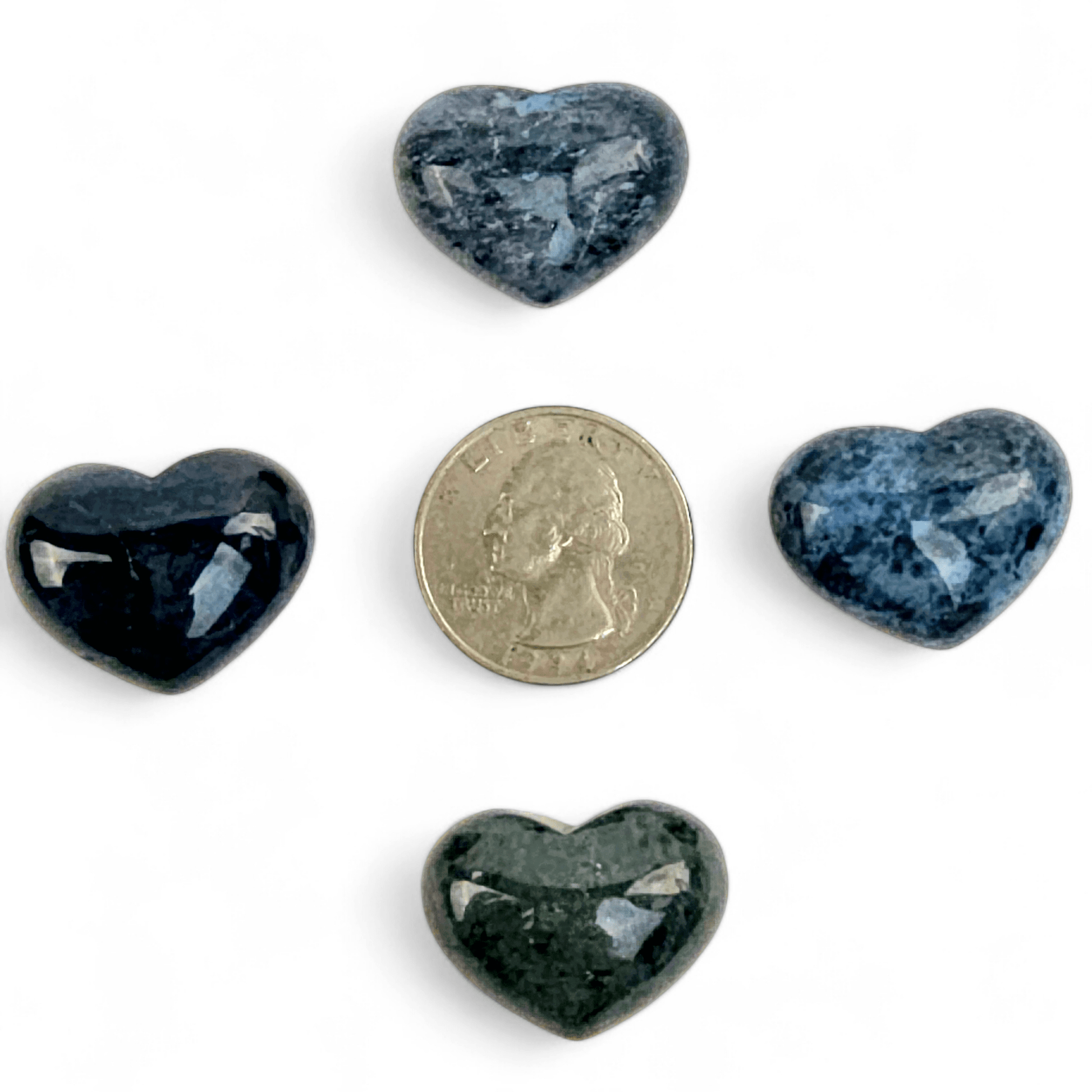Sodalite Small Crystal Heart four shown top front view with quarter for size reference on white background
