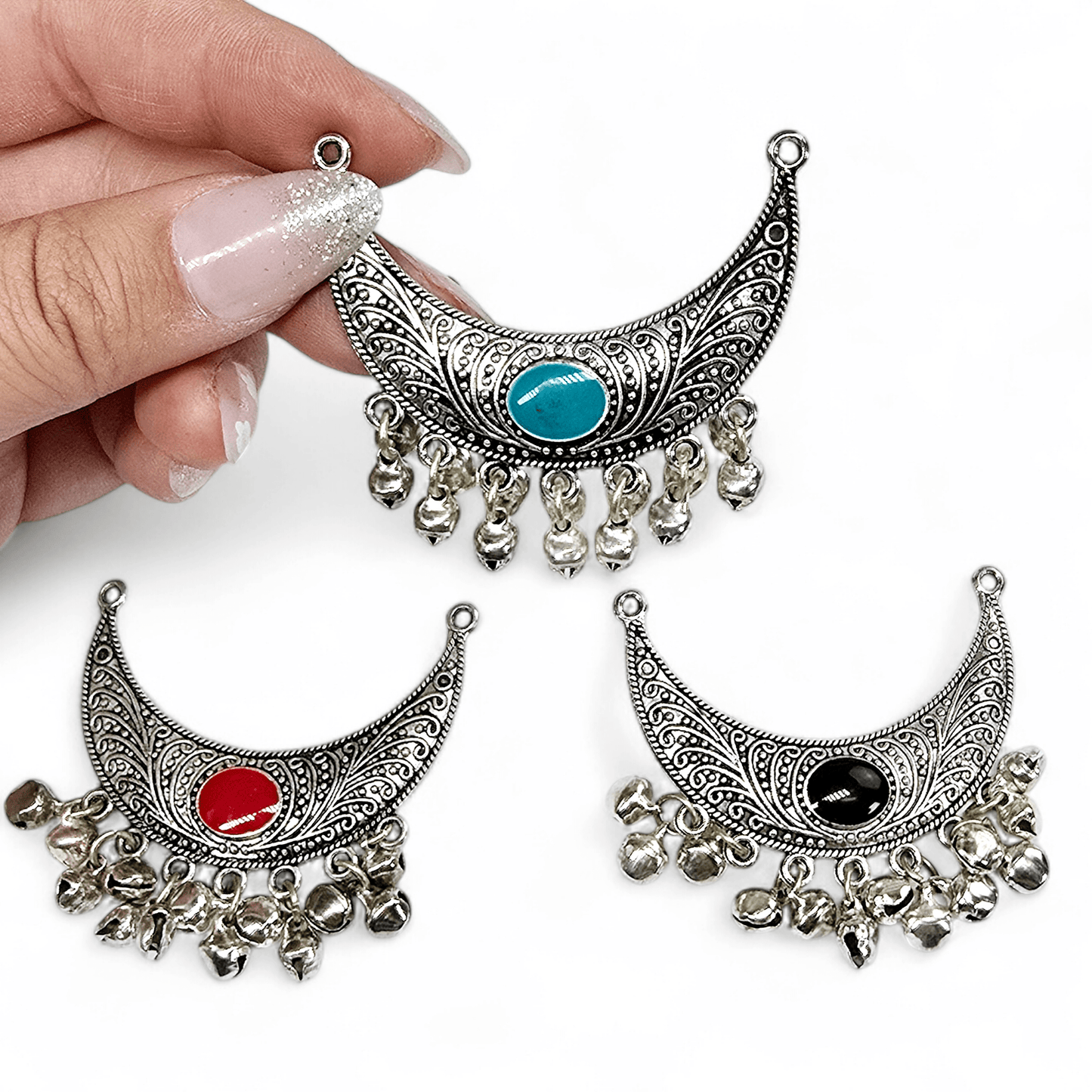 Crescent Silver Toned Double Bail Pendant with Enamel Accent and Jingle Bells - You Choose Color hand holding turquoise variant for size reference with other variants in the background