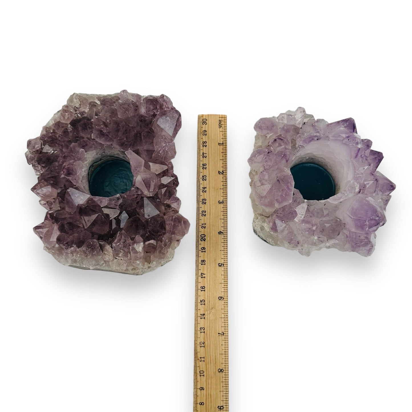 candle holders next to a ruler for size reference 