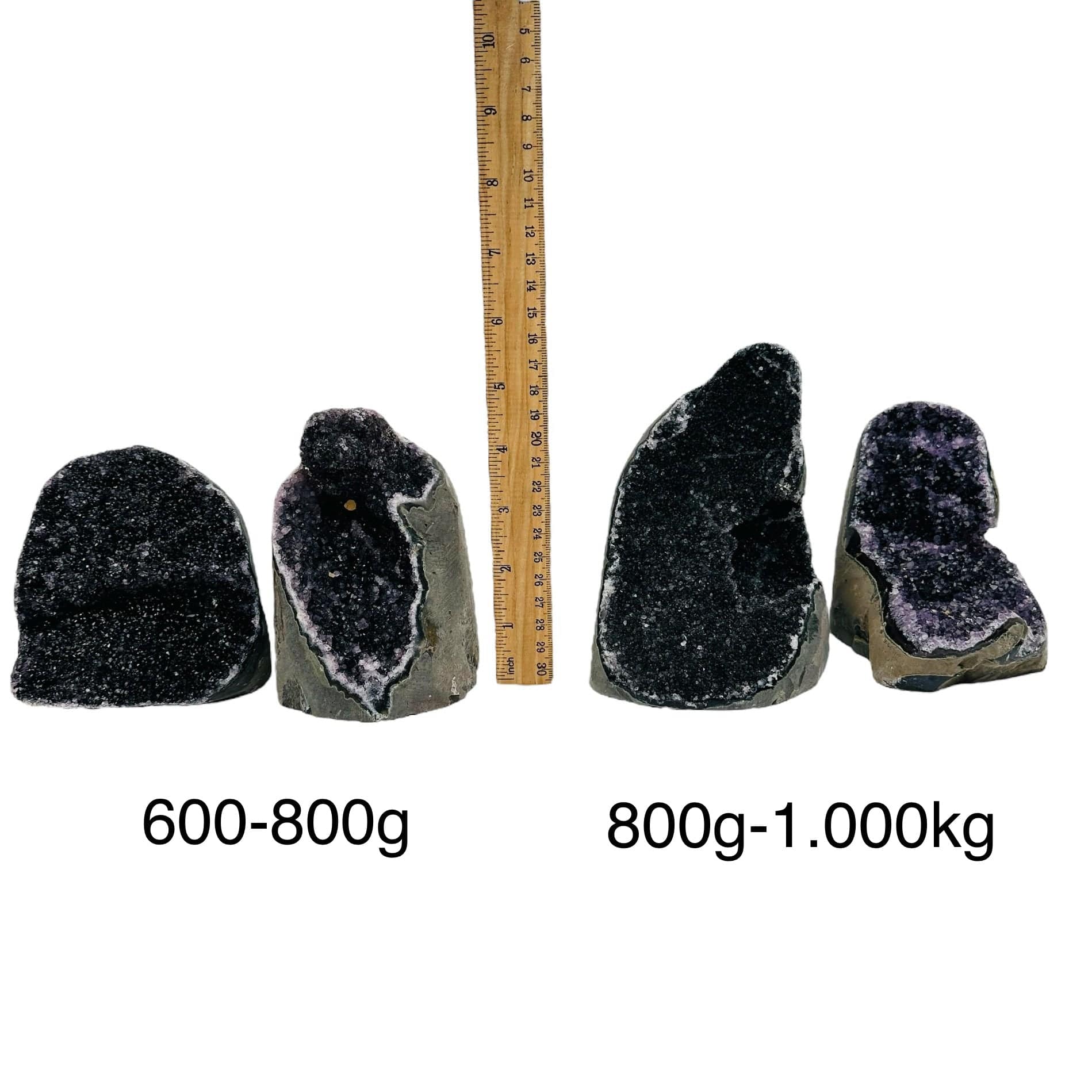 black amethyst druzy cut base crystals next to a ruler for size reference. sold by weight 