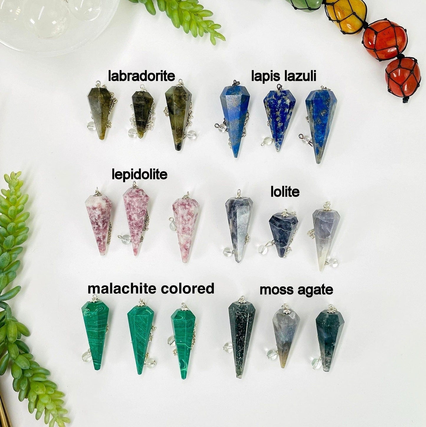 multiple pendulums displayed to show the differences in the crystal types 