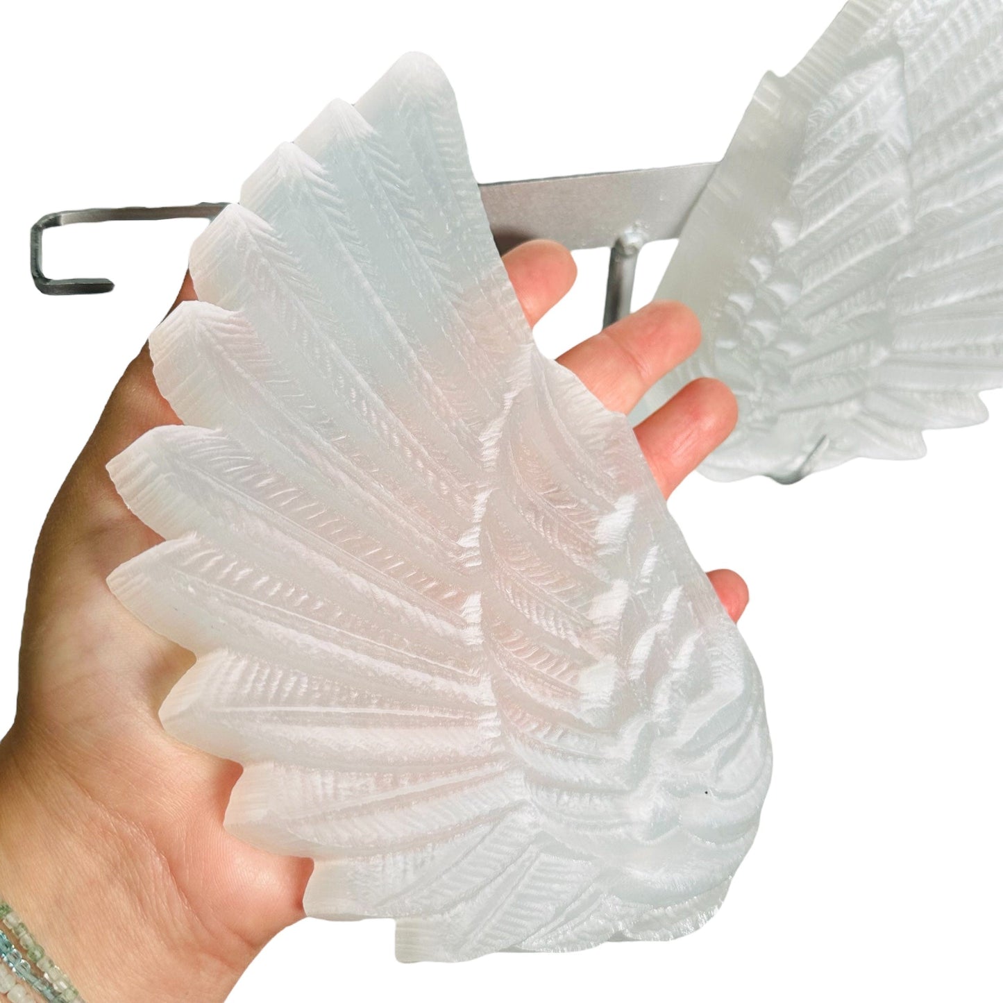 carved wings can come off the stand 