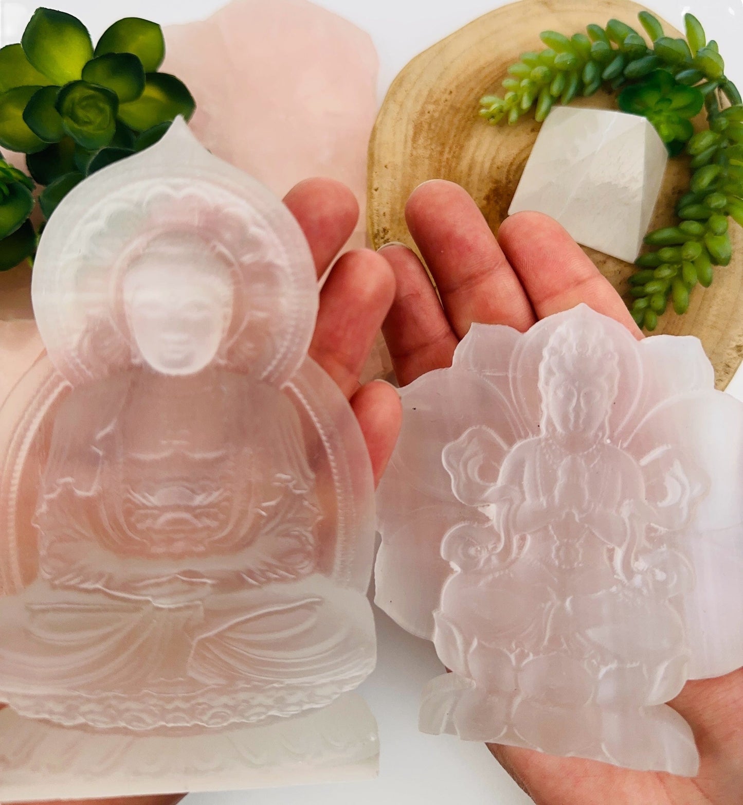 close up of the details on these selenite carvings 