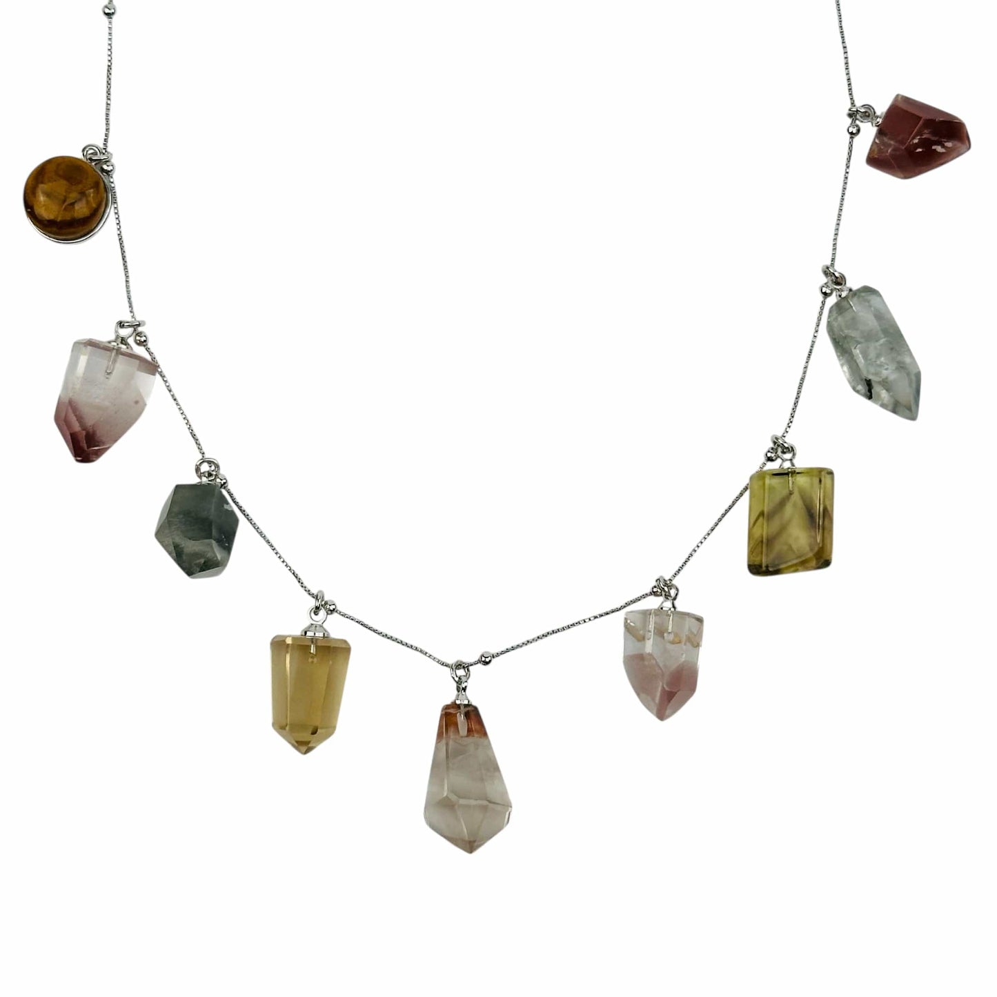 close up of the gemstone charms on this necklace 
