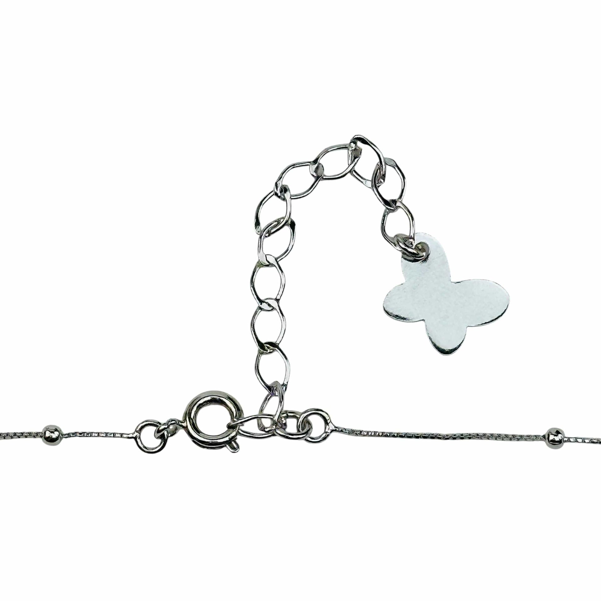close up of the necklace clasp and charm 