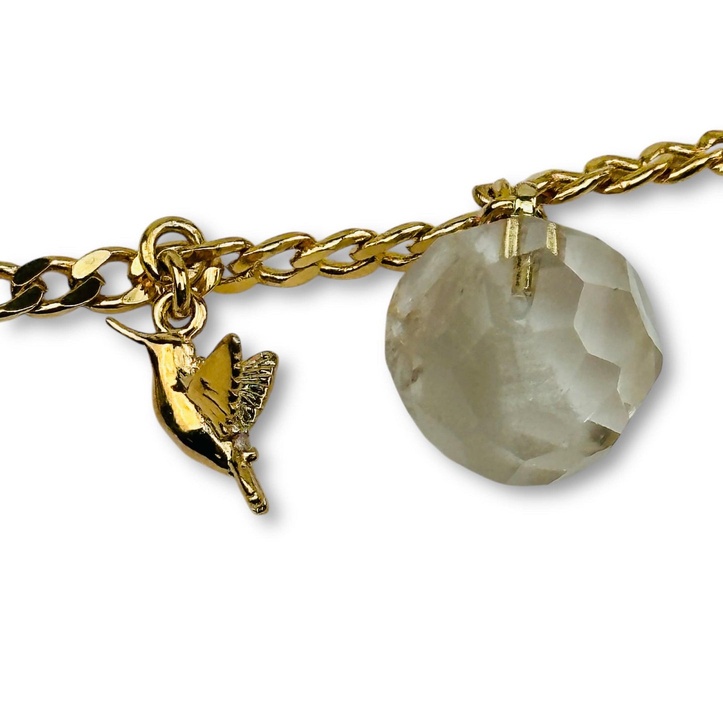 close up of the hummingbird and crystal charms 