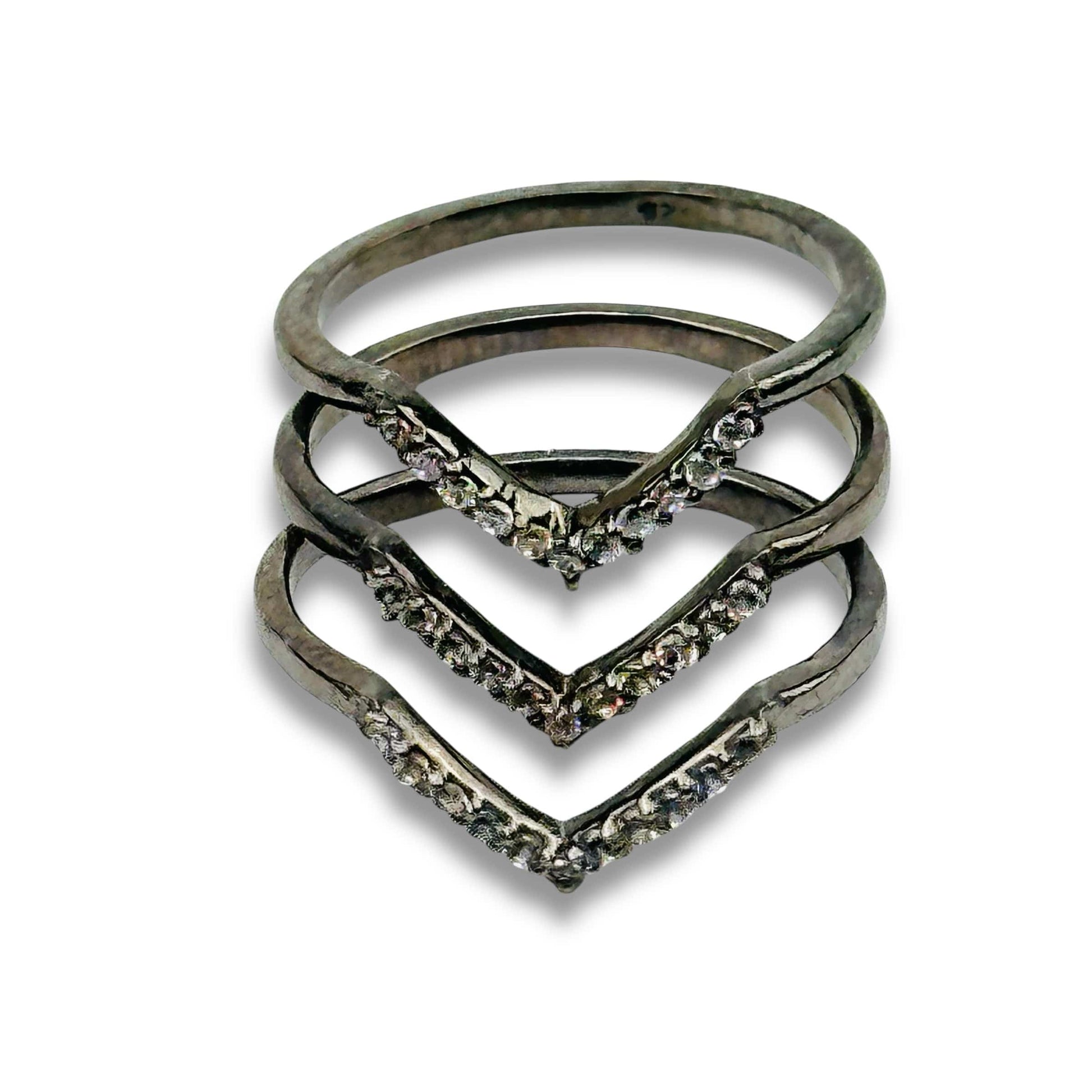 multiple rings displayed to show the differences in the gemstones 