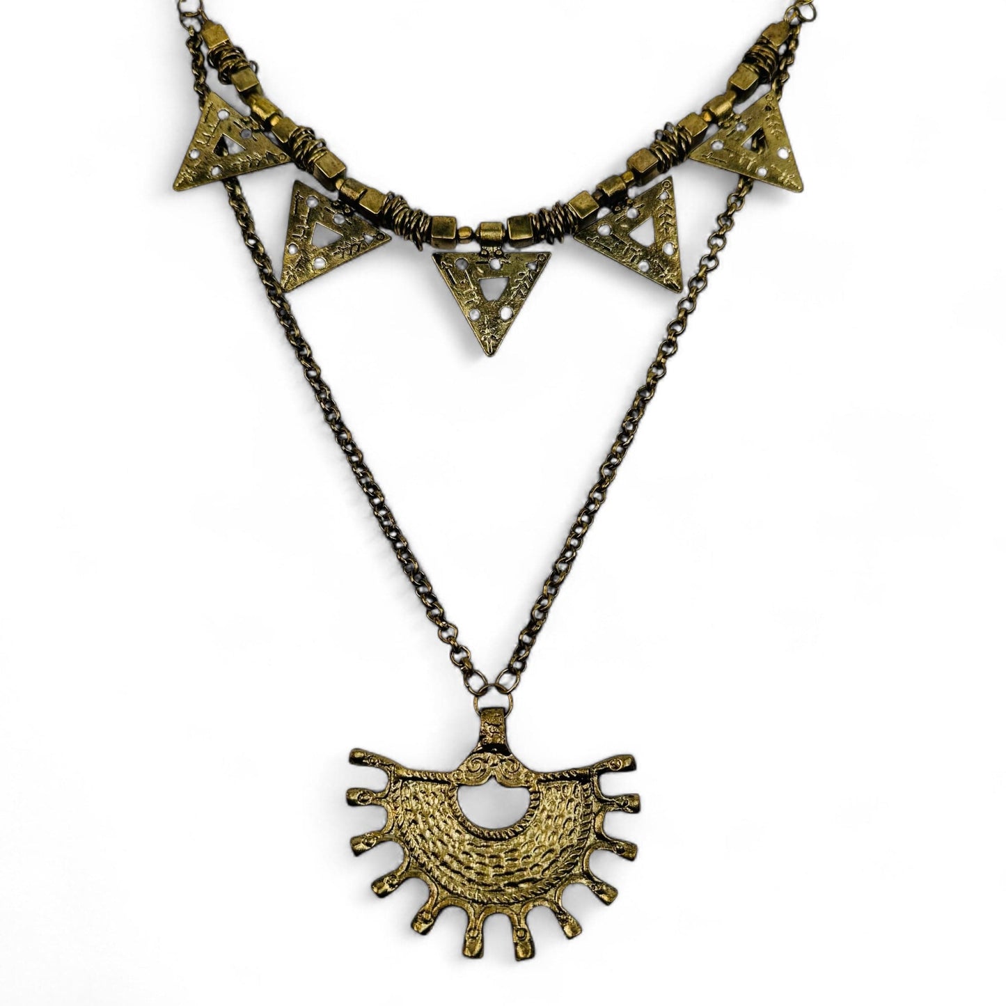 close up of the details on this brass necklace 