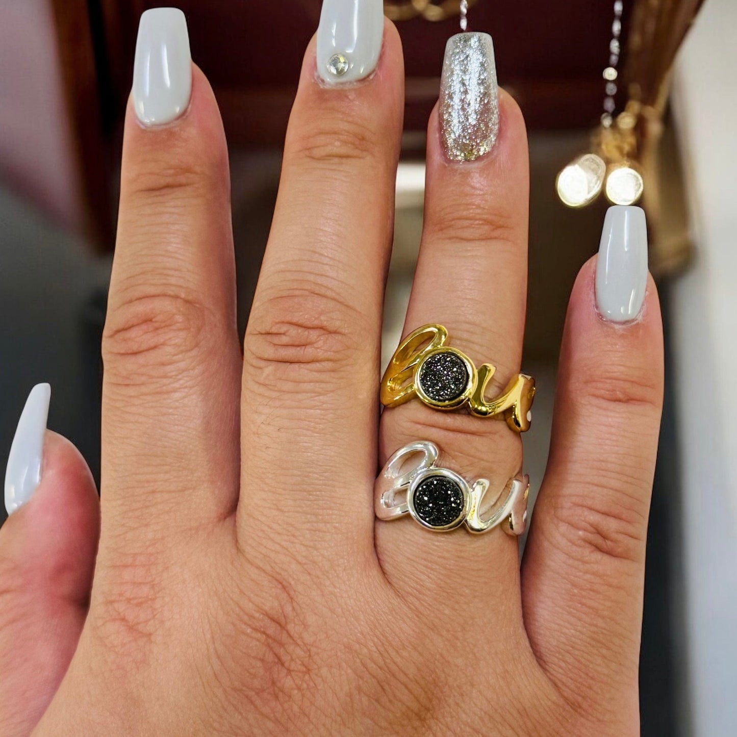 rings displayed on hand for size reference 