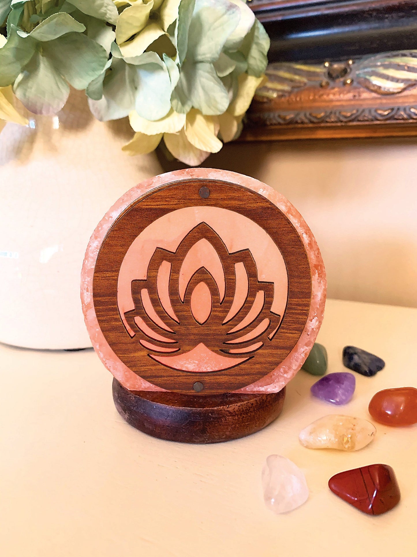 himalayan salt lamp with a lotus flower design 