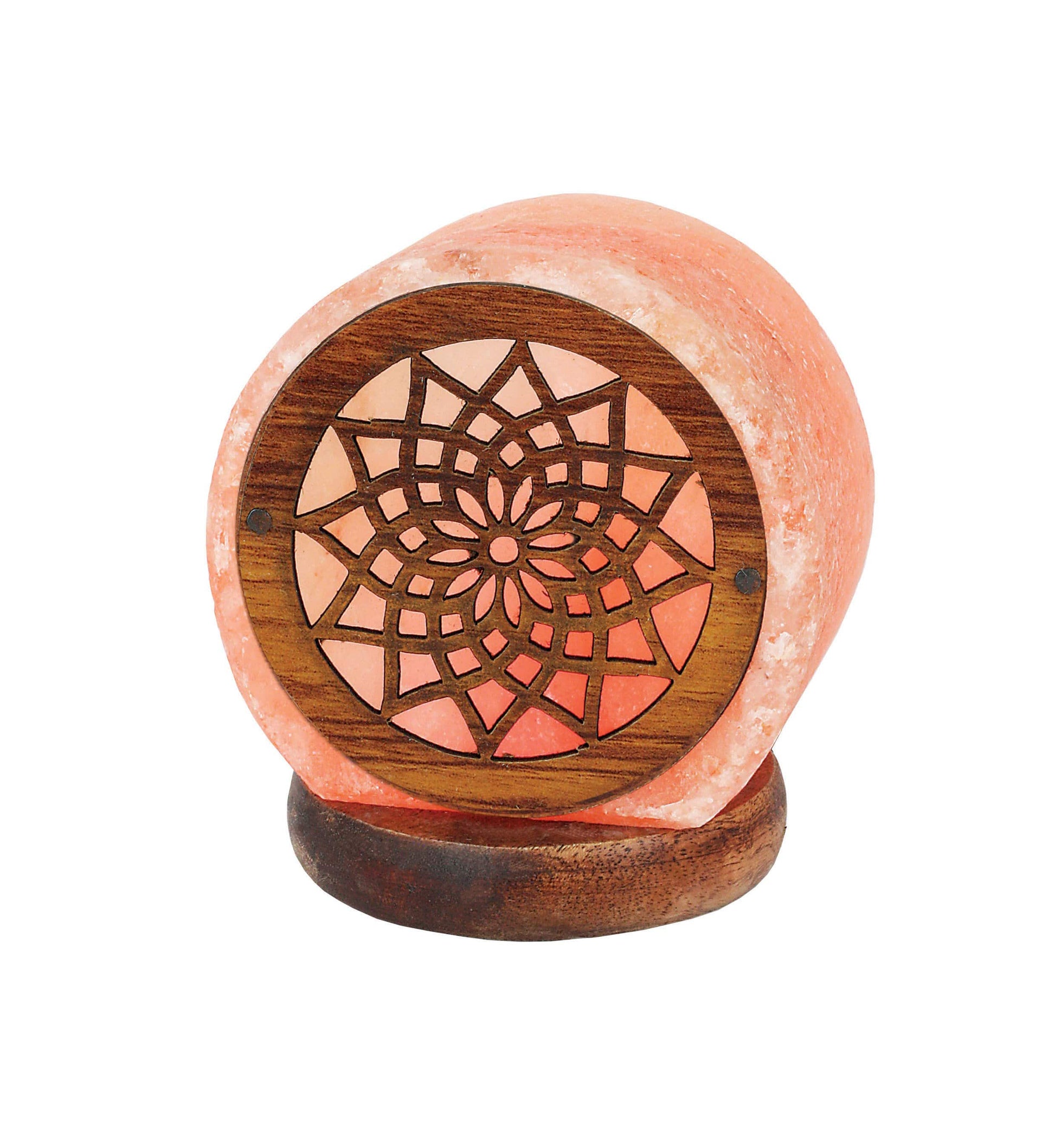 himalayan salt lamp with a flower pattern in the front 