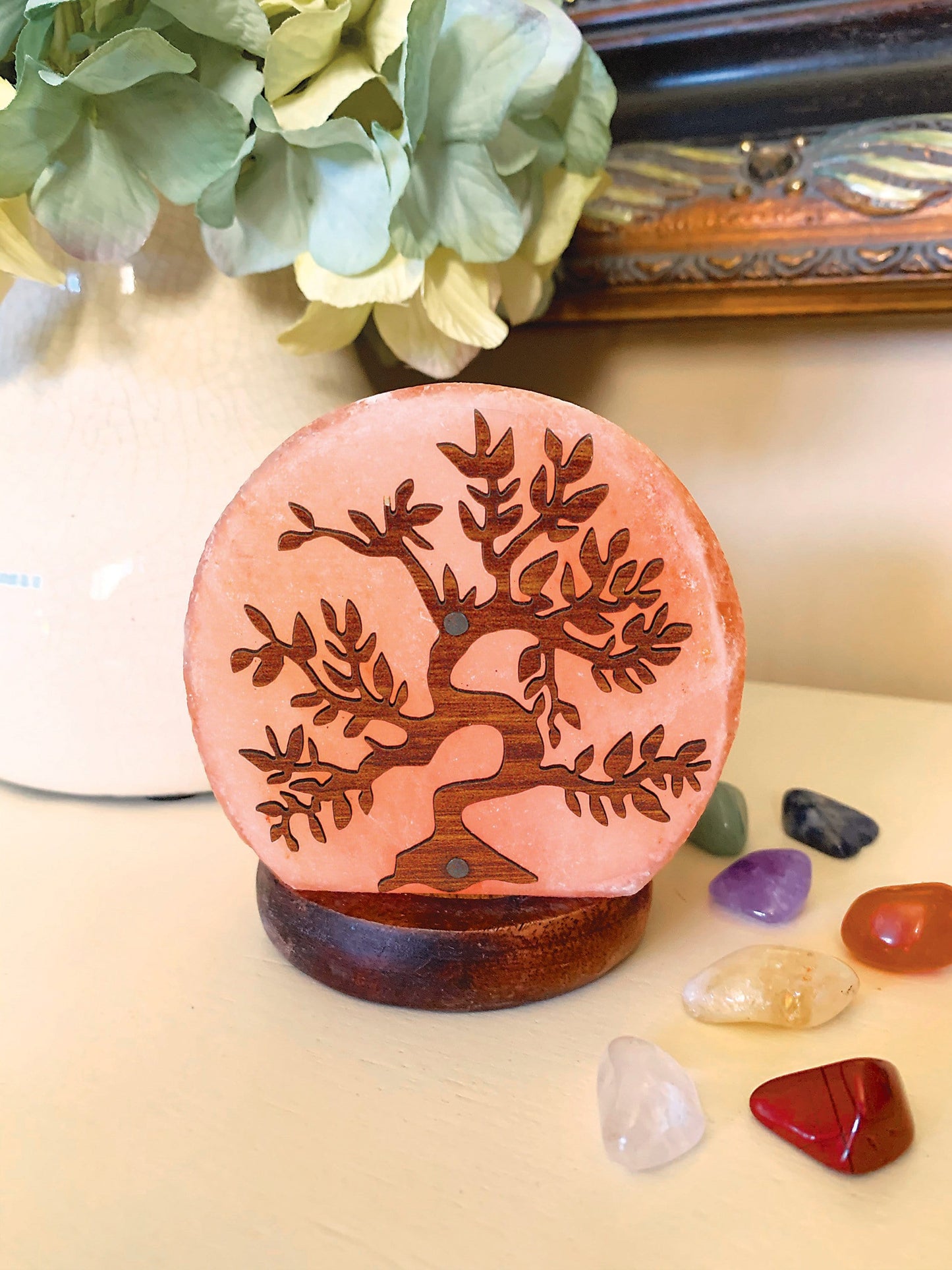 himalayan salt lamp with a tree pattern 