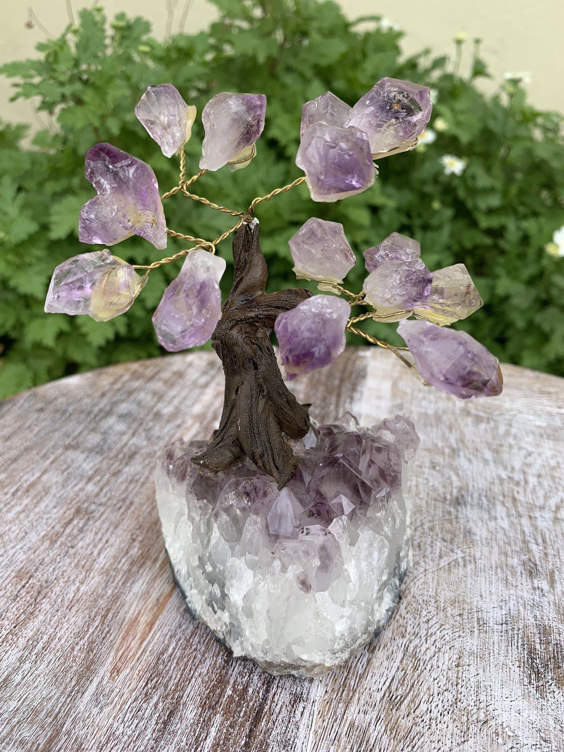 close up of the amethyst base with amethyst clusters on top 