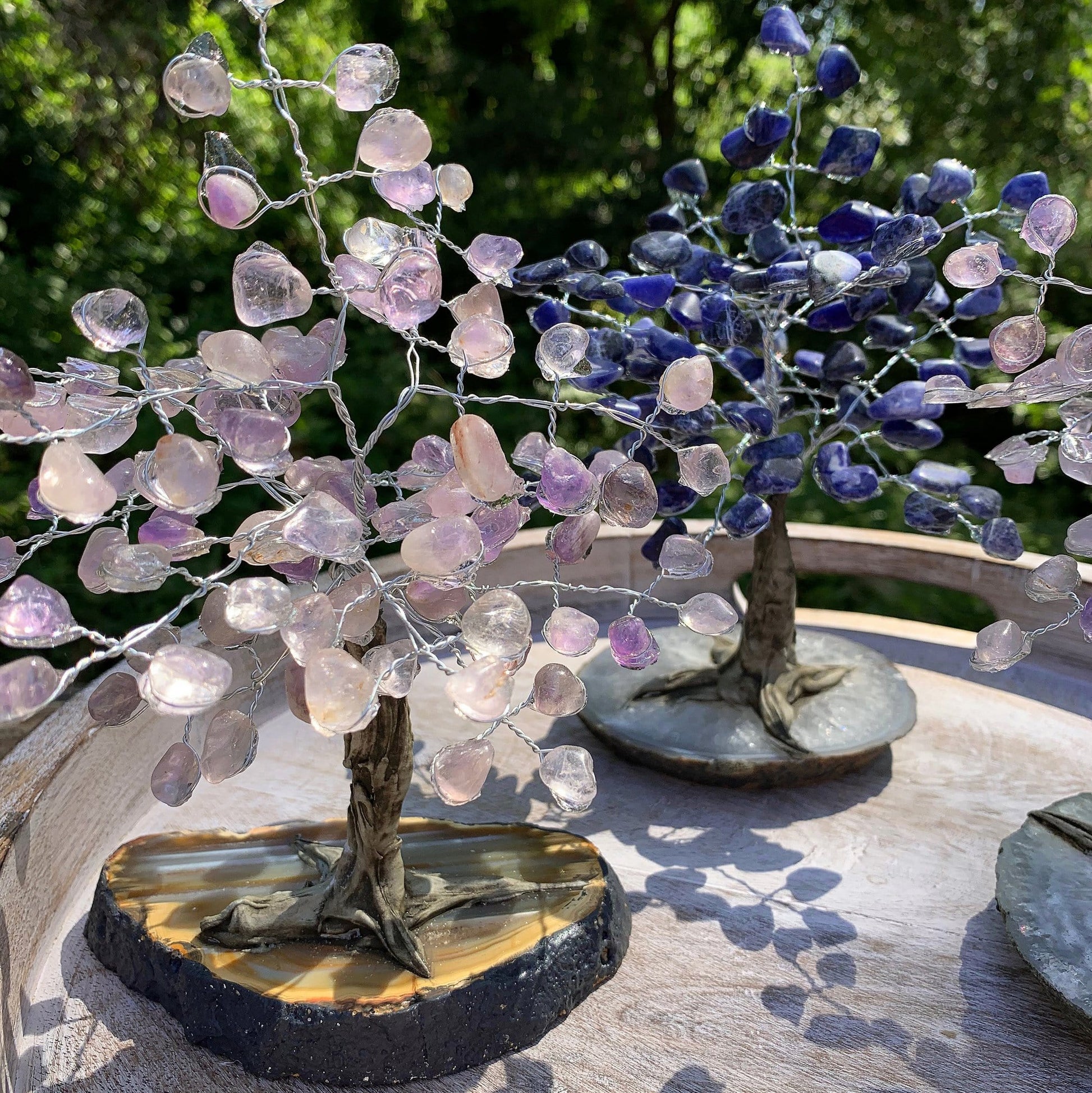 Tumbled Stone Trees on Agate Slab - close up of amethyst tree