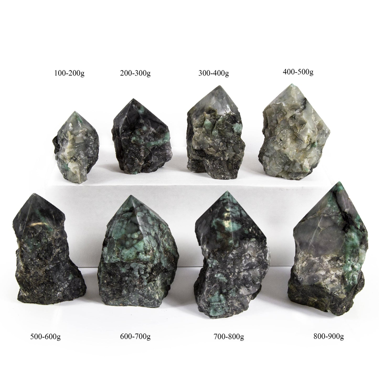 8 Emerald points line up displaying the weight that we have available on a white background.