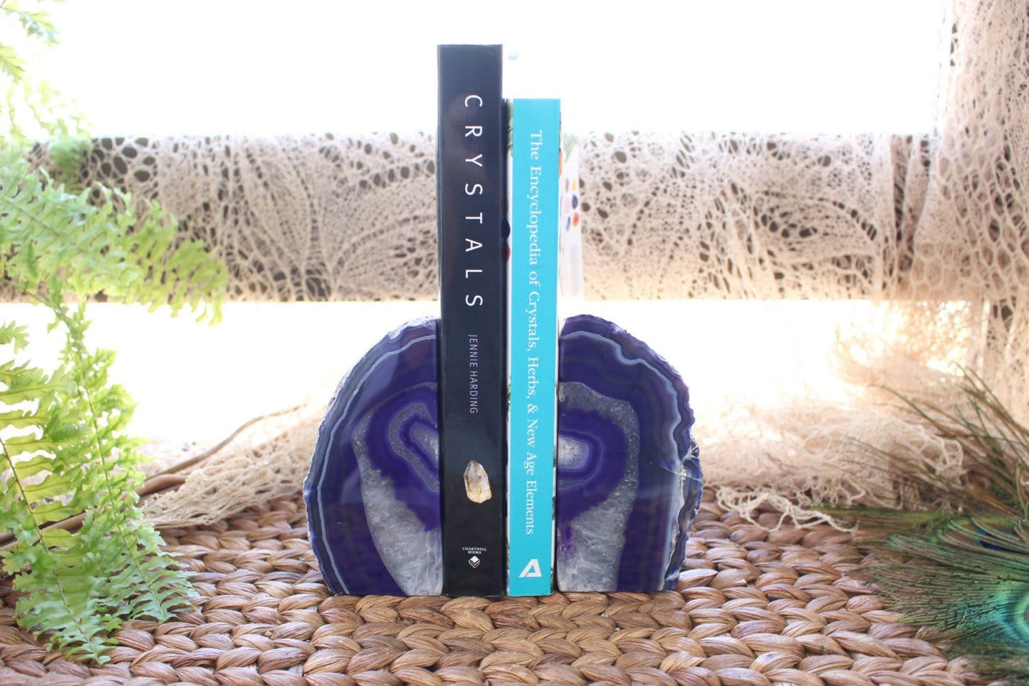 Purple Agate Bookend Pair holding books in an alter.