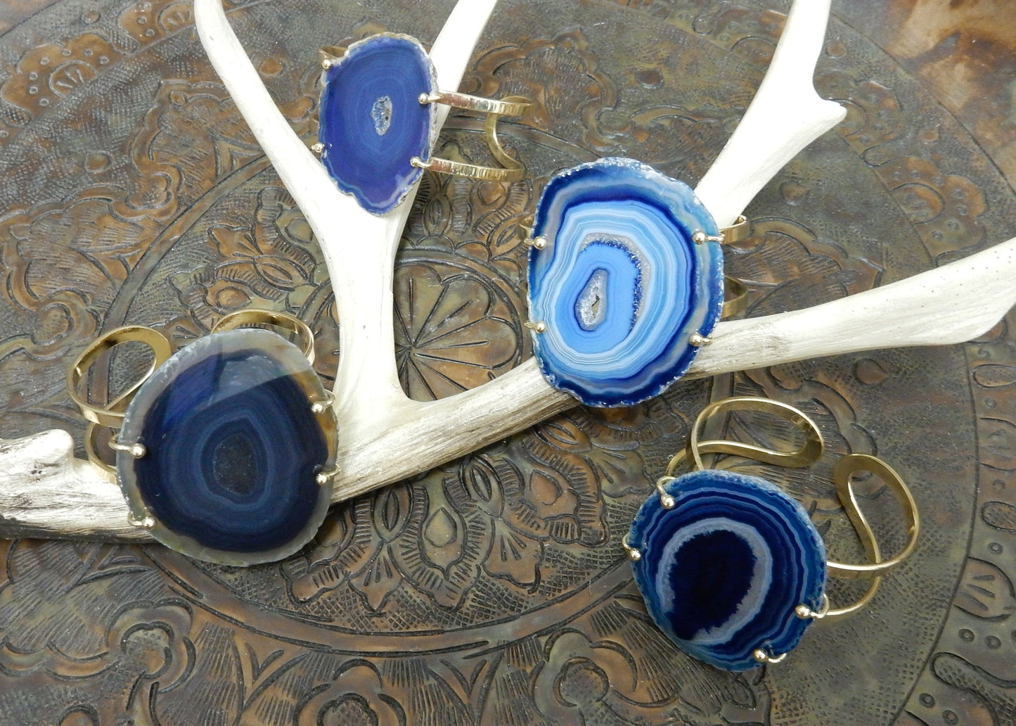 Blue Agate Slice on Electroplated 24k Gold Adjustable Bracelets are front facing to show variation in agate pattern.