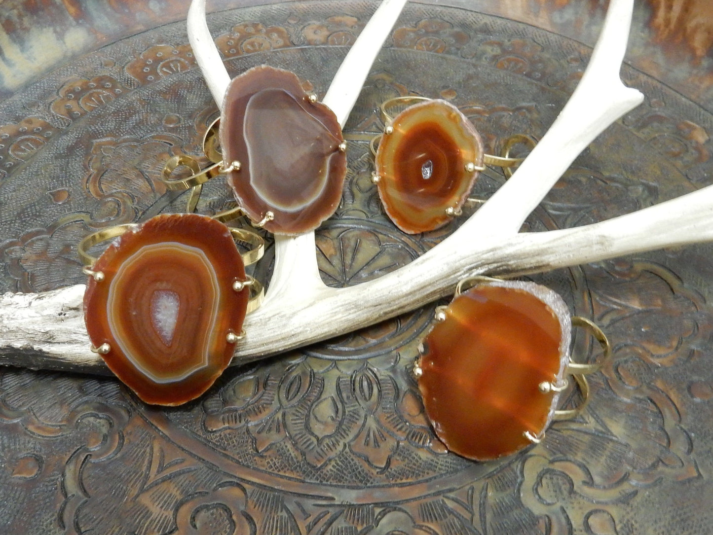 Orange Agate Slice on Electroplated 24k Gold Adjustable Bracelets are front facing to show variation in agate pattern.