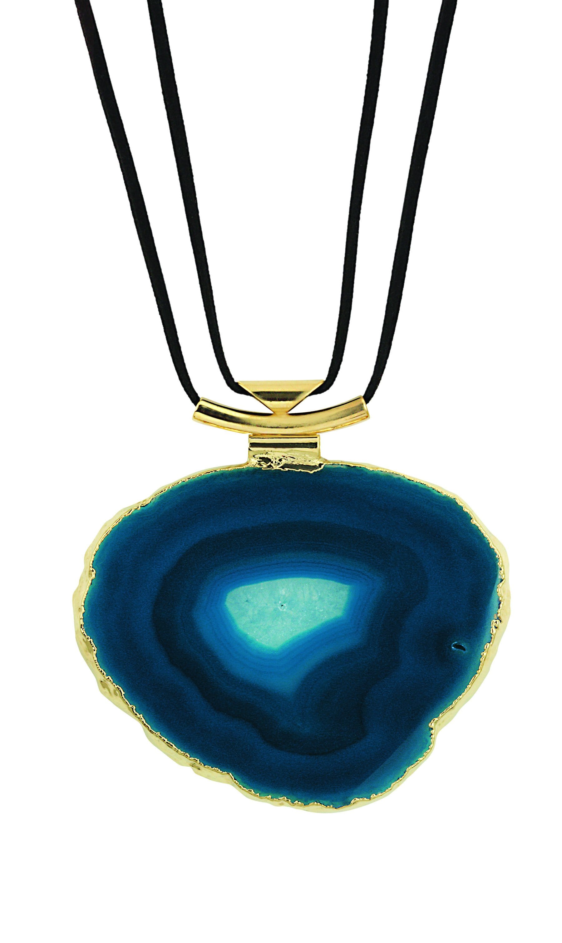 A teal agate necklace with black leather cord and gold bail with a white background.