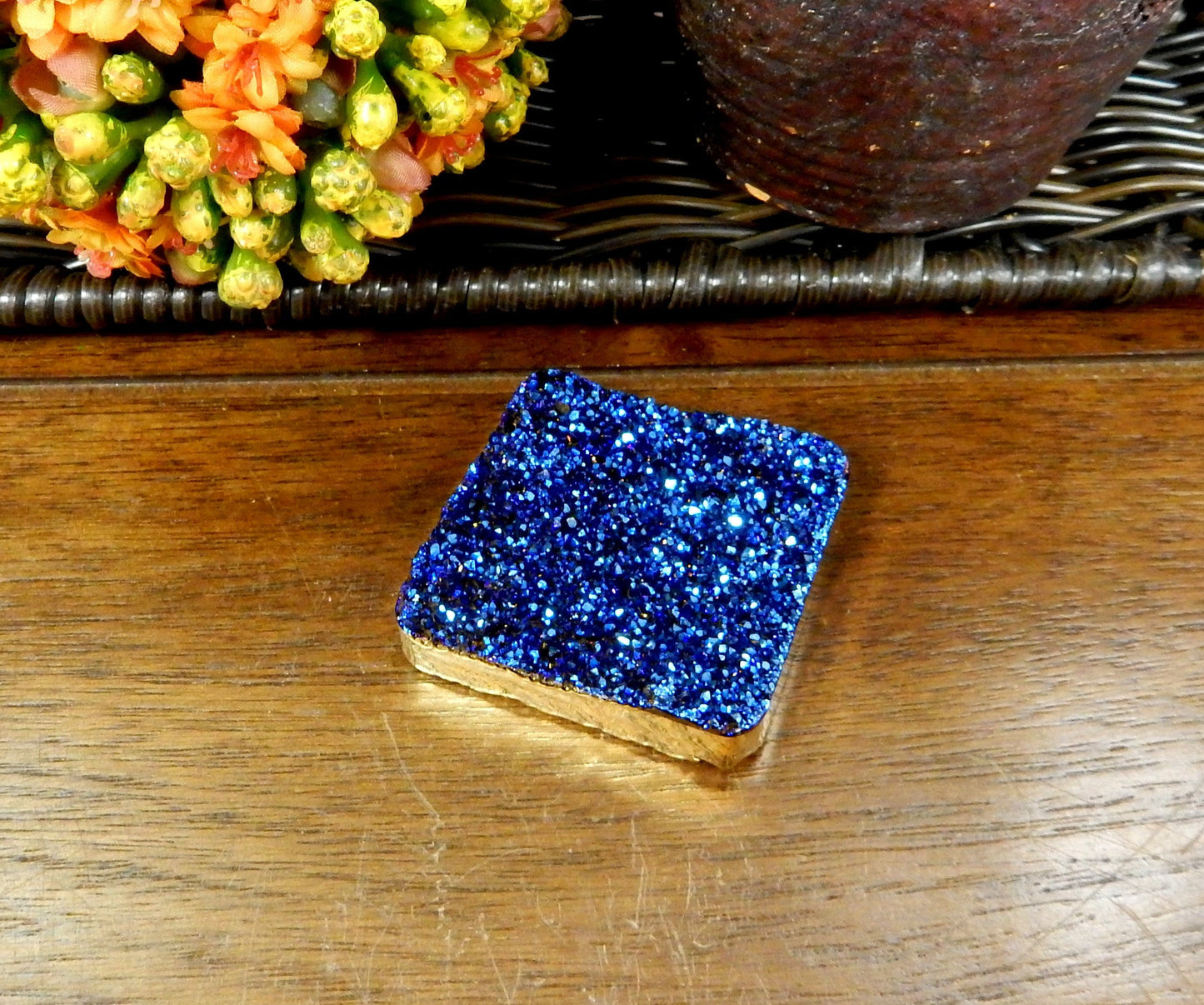 up close of the blue titanium druzy bead to view texture details