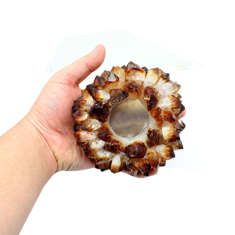 Citrine Point Candle Holder - in a hand