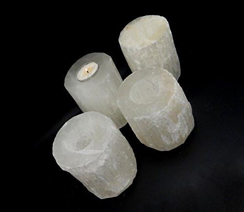 selenite candle holders on display for possible variations