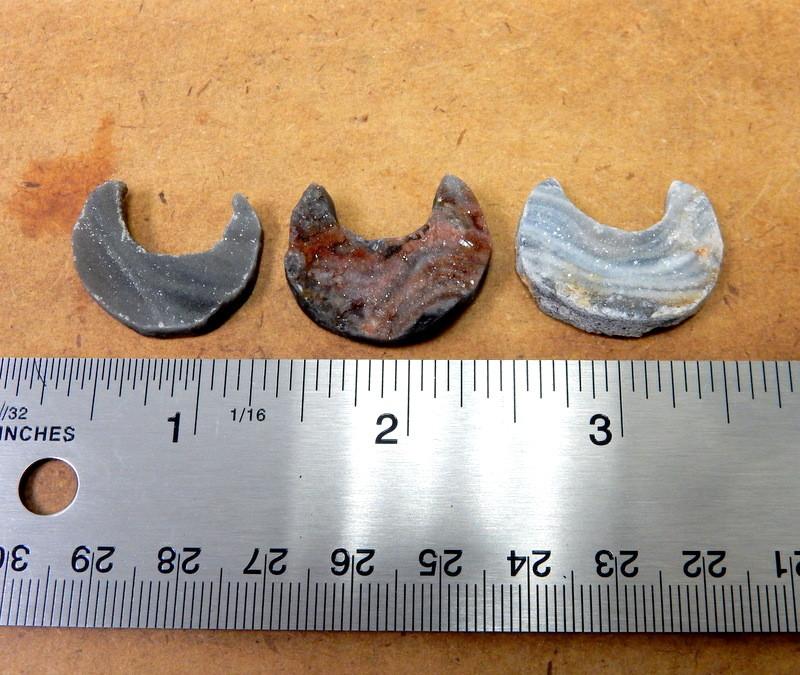 3 Raw Chalcedony Moon Crescents lined up next to ruler for size reference