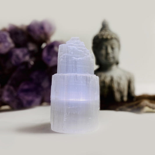close up of selenite lamp turned on in natural light