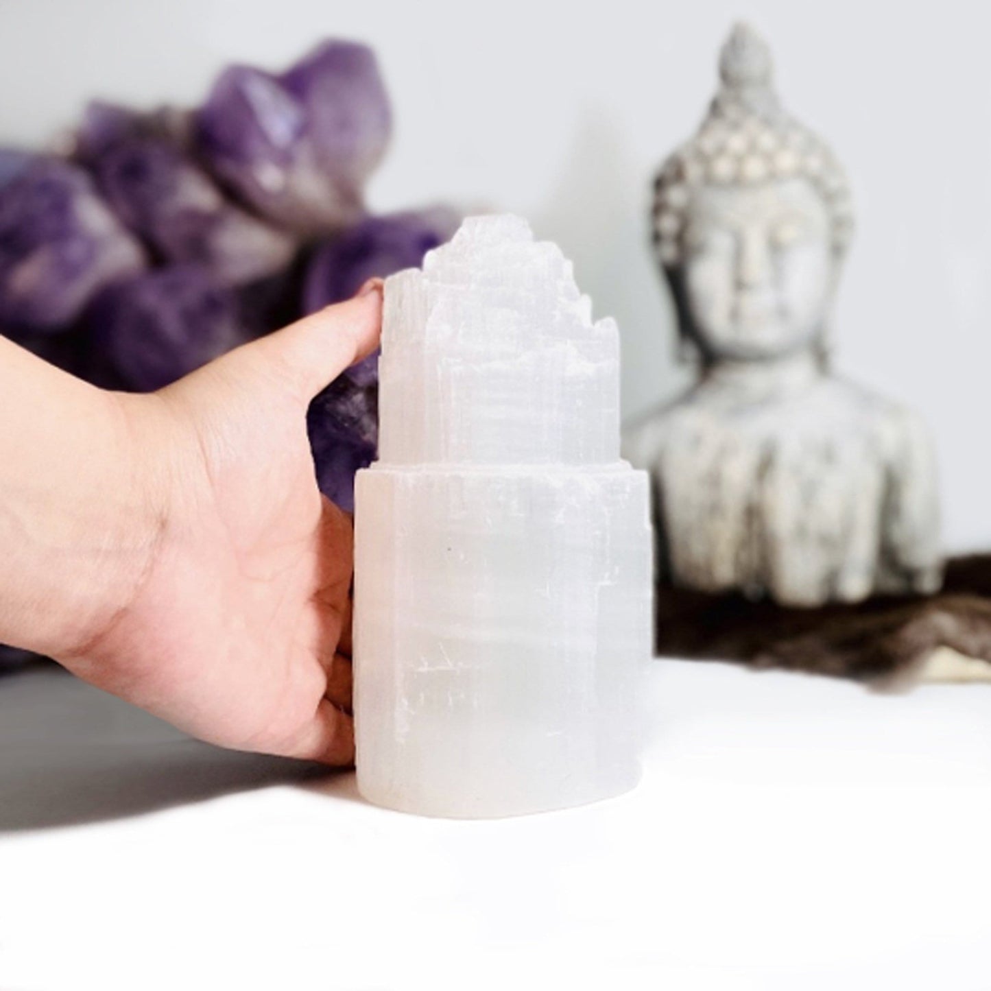 selenite lamp in hand for size reference