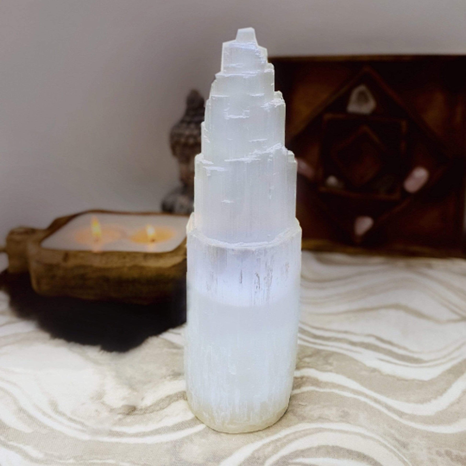 Large selenite lamp lit up.