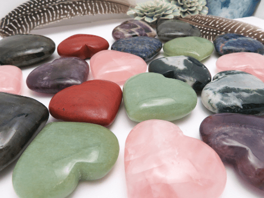 side shot of multiple stone hearts showing the different thicknesses