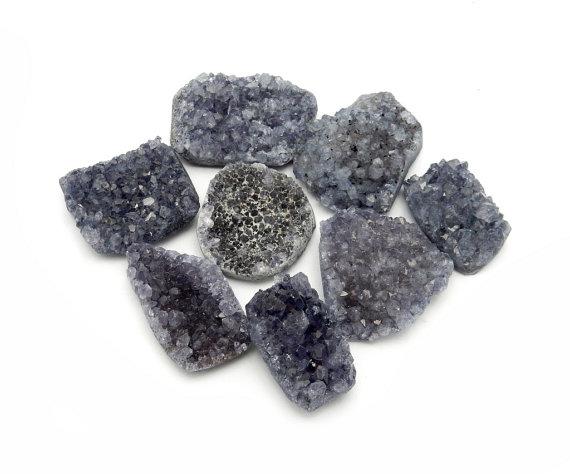 druzy cabochons with decorations in the background