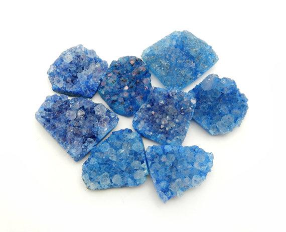 druzy cabochons with decorations in the background