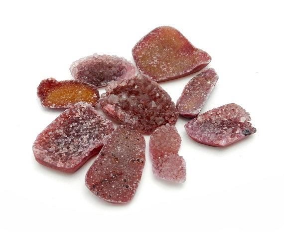 druzy cabochons with decorations in the background