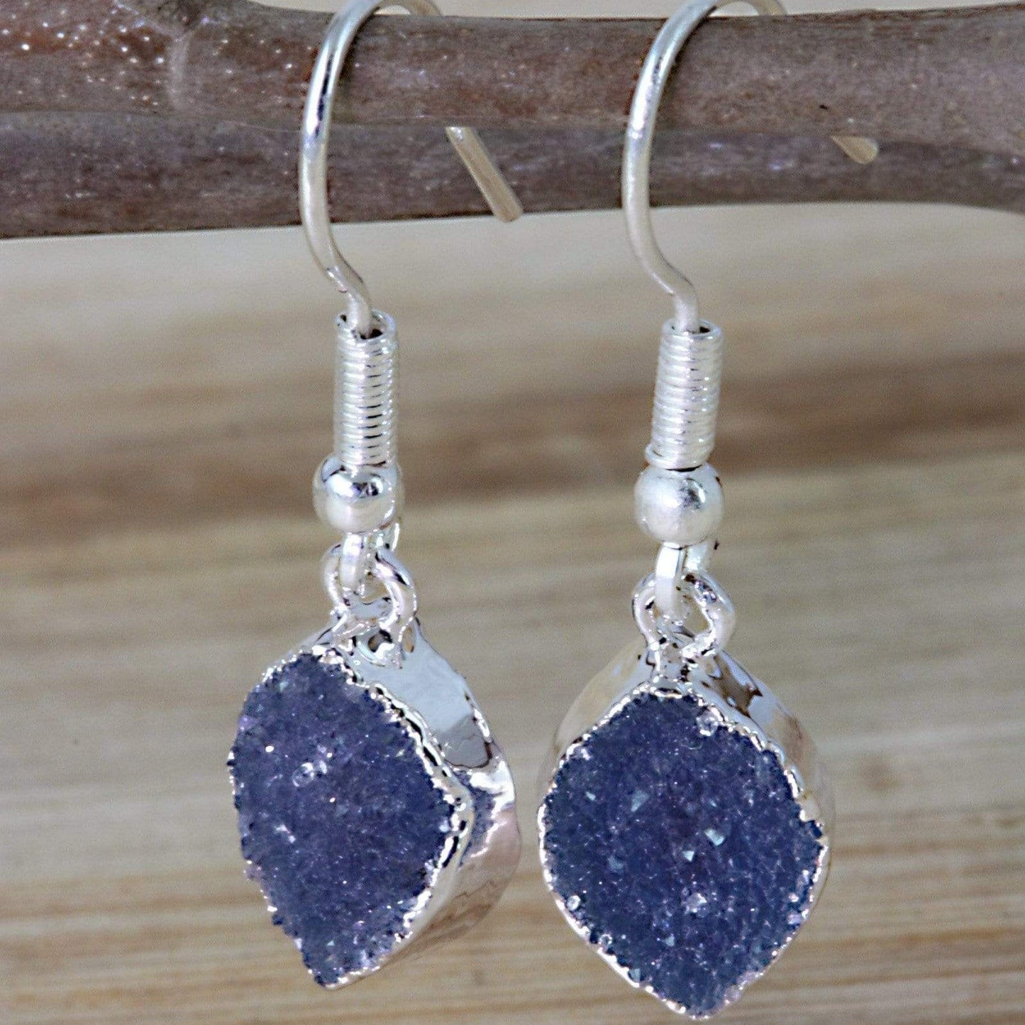 marquise purple druzy earrings on a branch