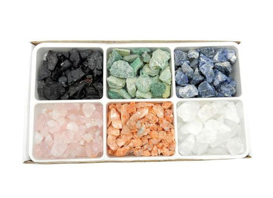 Box of rough stone mixes crystals
