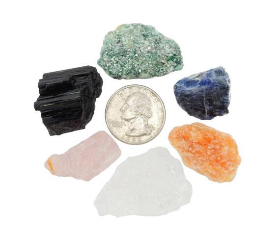 Mixed crystals surrounding a quarter for size reference